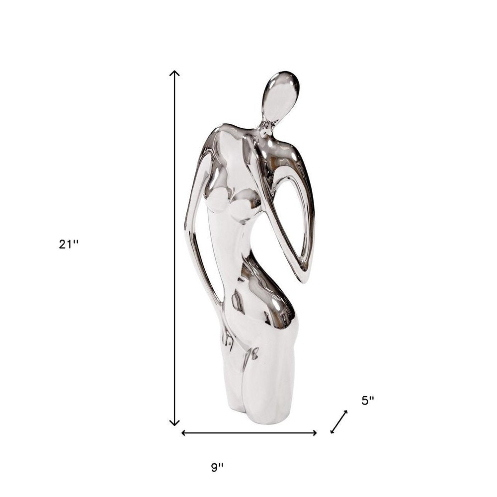 21" Nickel Glass Tabletop Sculpture. Sculpture isolated on a plain white background, finished in silver glass.