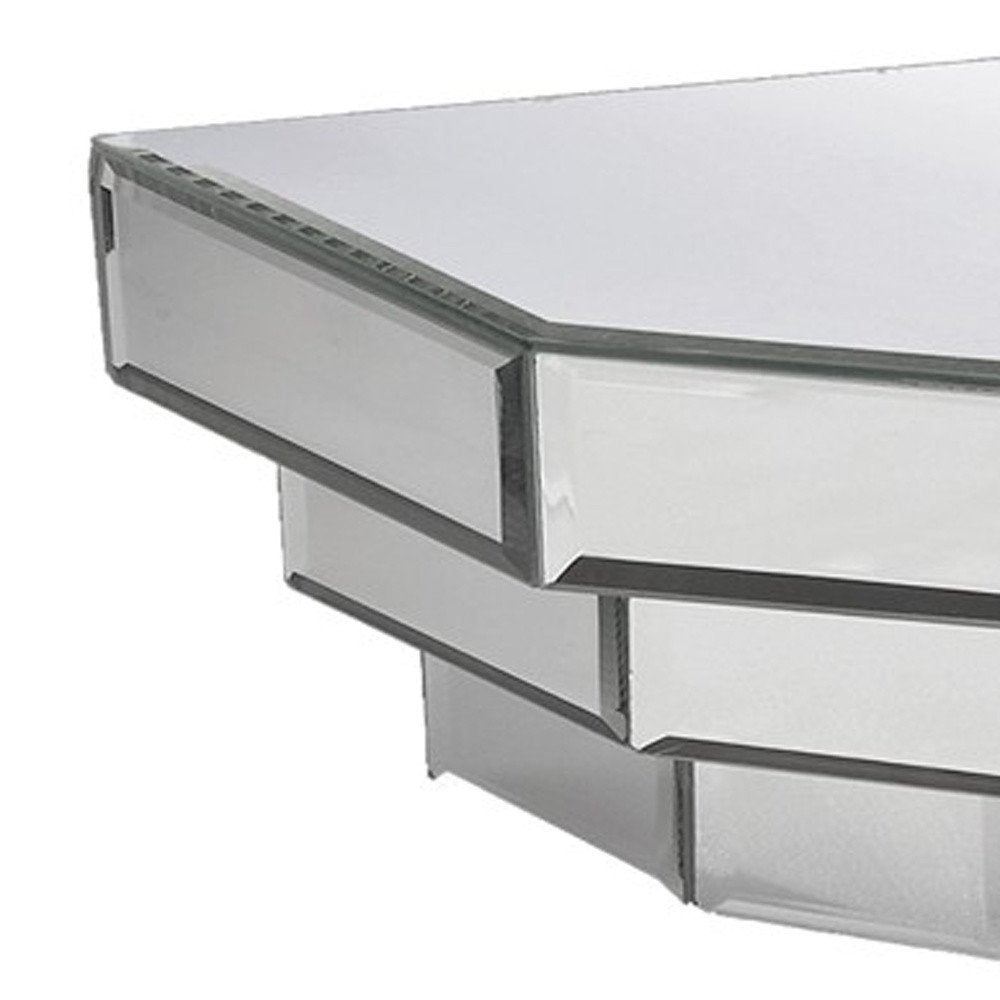 16" Silver Mirrored Glass Hanging Dimensional Floating Shelf. Wall mounted shelve isolated on a plain white background, showing a silver glass surface.
