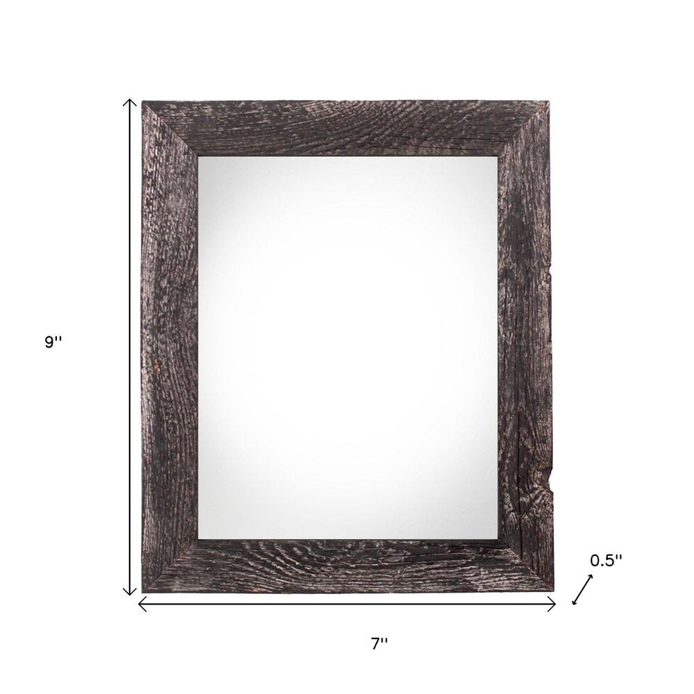 4" x 6" Black Solid Wood Tabletop Picture Frame. Picture frame isolated on a plain white background, finished in black wood.