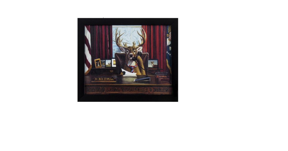 Framed art print of a deer wearing a tie sitting at a desk with the words "The Buck Stops Here" on it.