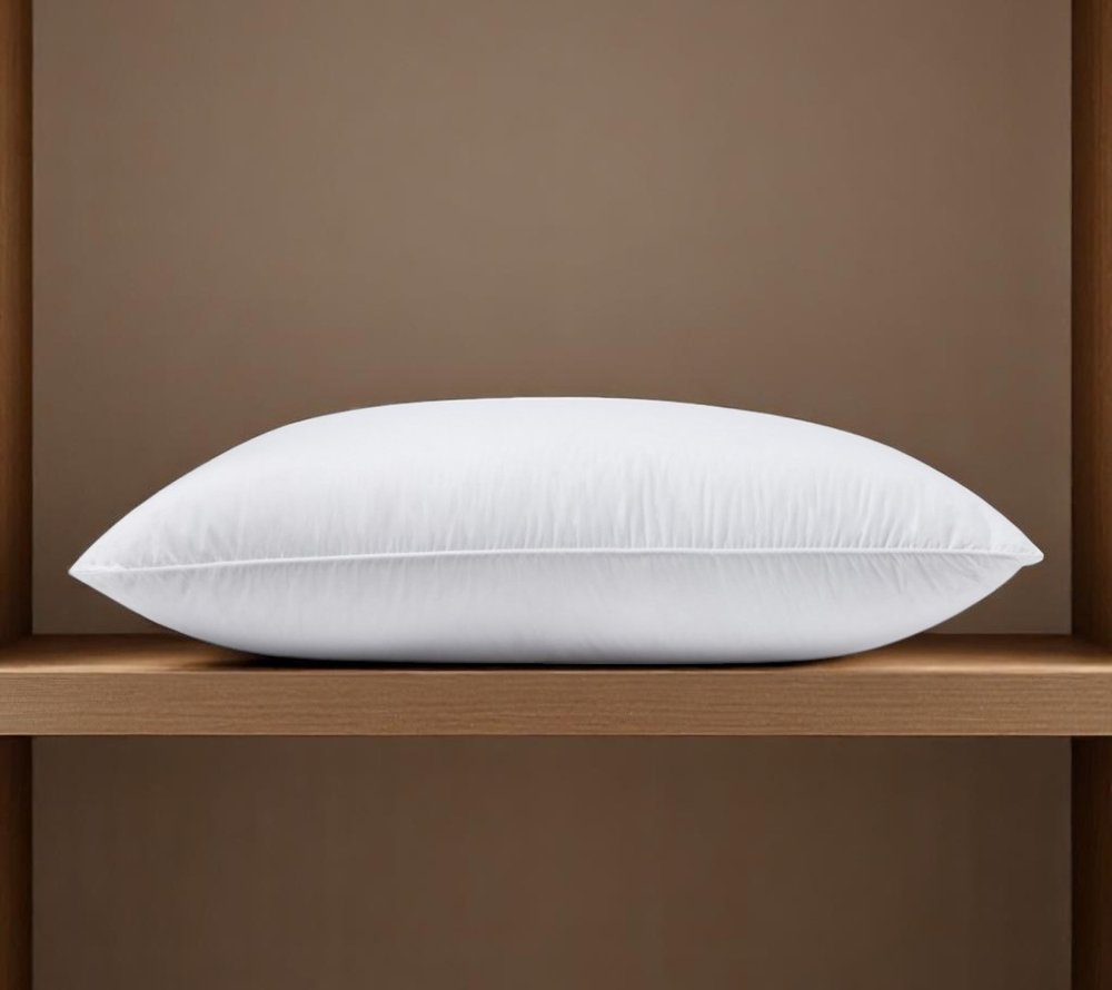 Close-up of 100% Cotton Lux Sateen Down Alternative Medium Hypoallergenic Standard Size Bed Pillow showing the dark brown cotton texture.