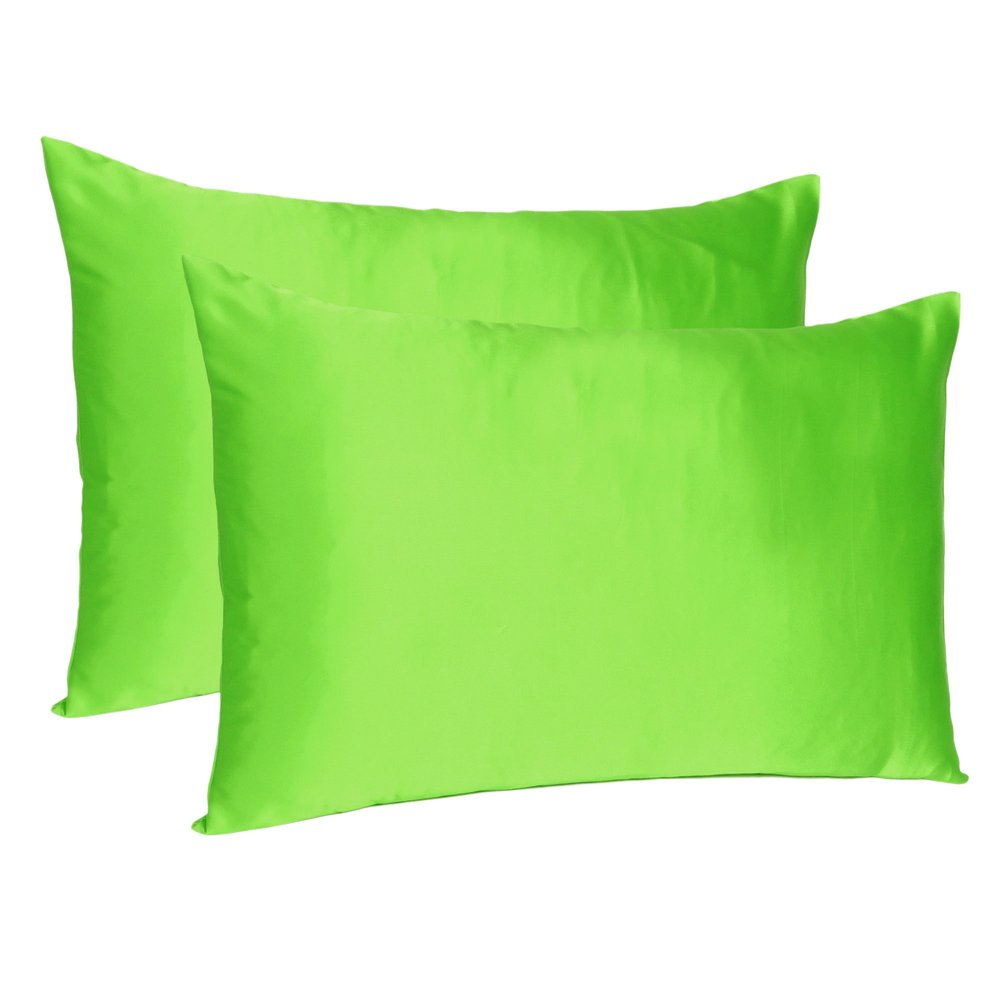Two bright green silky satin king pillowcases on a white background.