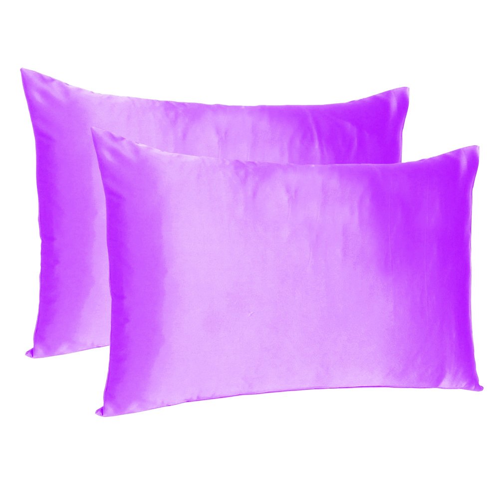Two violet silky satin standard pillowcases on a white background