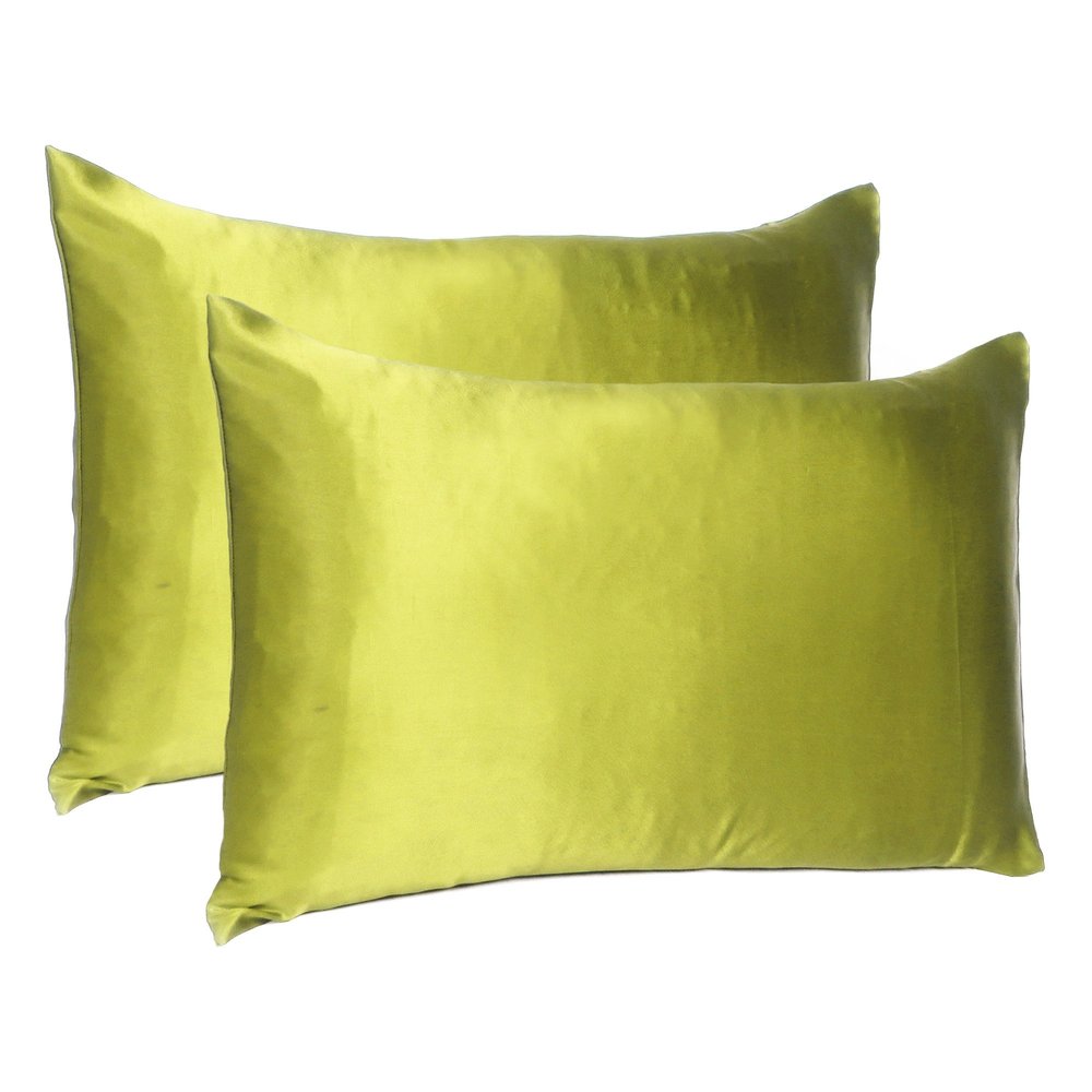 Two lemongrass-colored silk satin queen pillowcases on a white background.