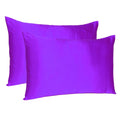 Set of Two Bright Purple Dreamy Silky Satin Queen Pillowcases on a white background