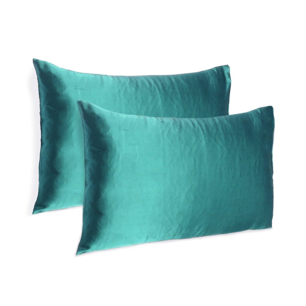 Two teal silky satin queen pillowcases on a white background.