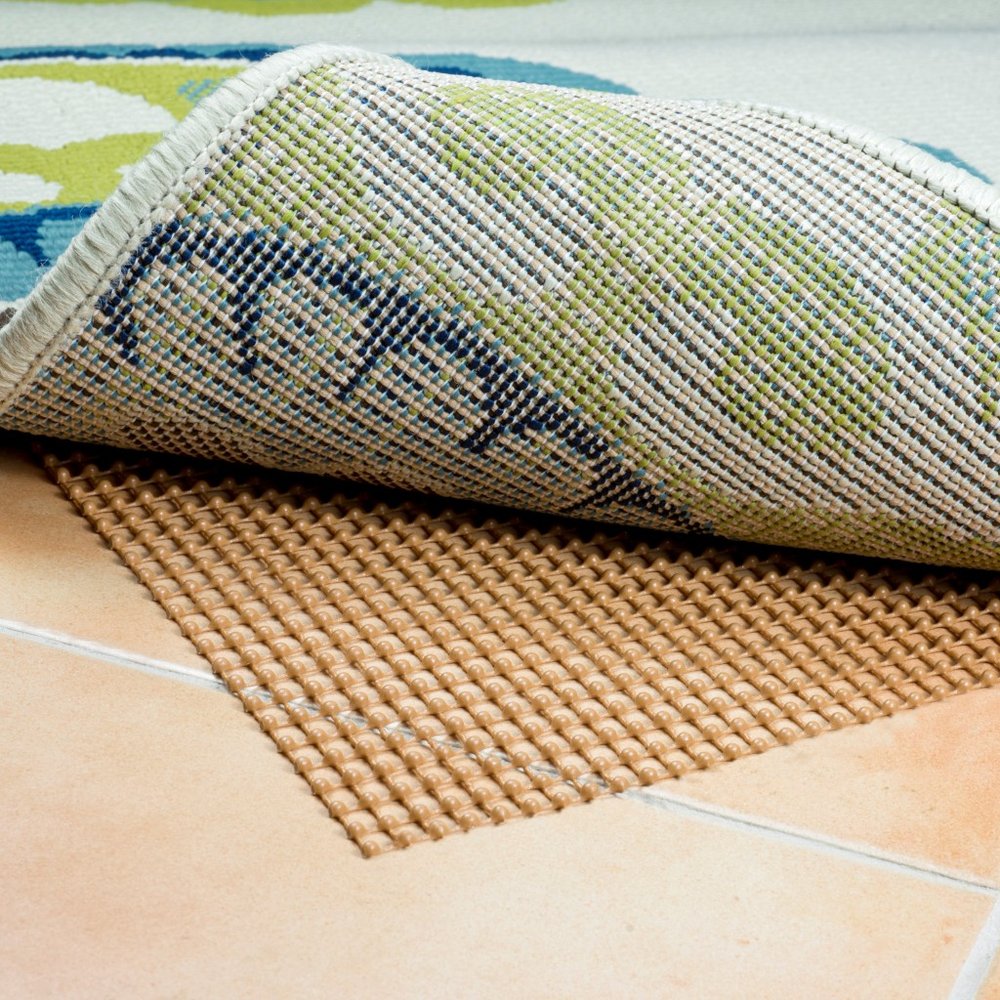 6' X 8' Brown Non Slip Indoor Outdoor Rug Pad shown as a full-frame view of the cream and off-white surface.