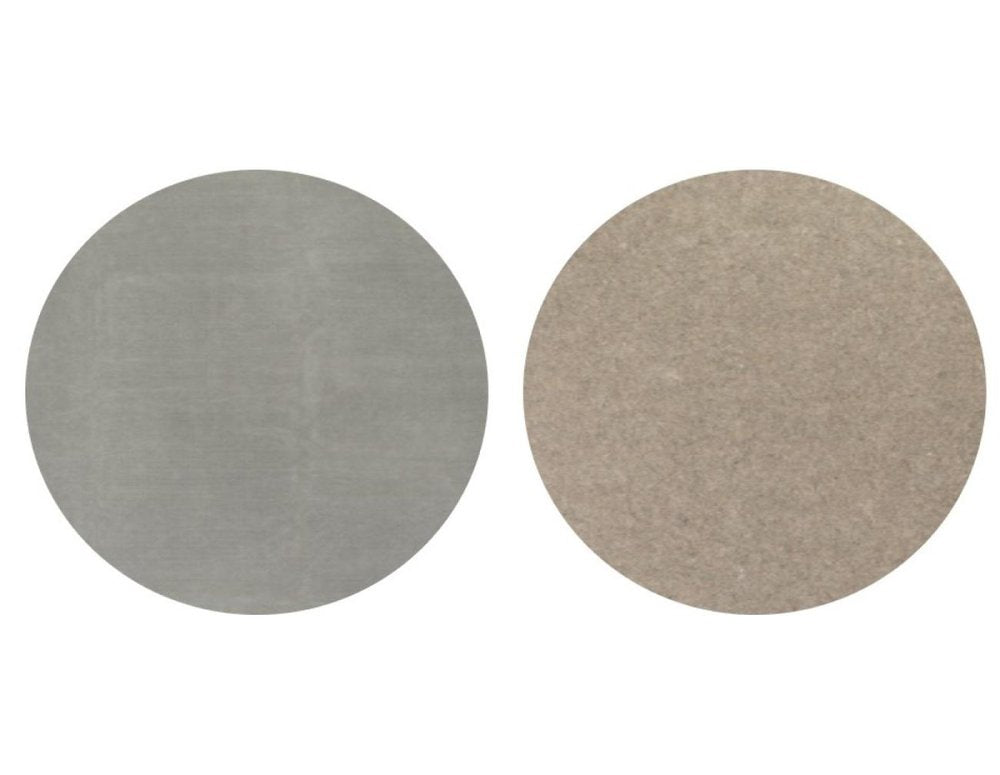 6' x 9' Gray Non Slip Rug Pad. Rug pad isolated on a plain white background, finished in gray plastic.