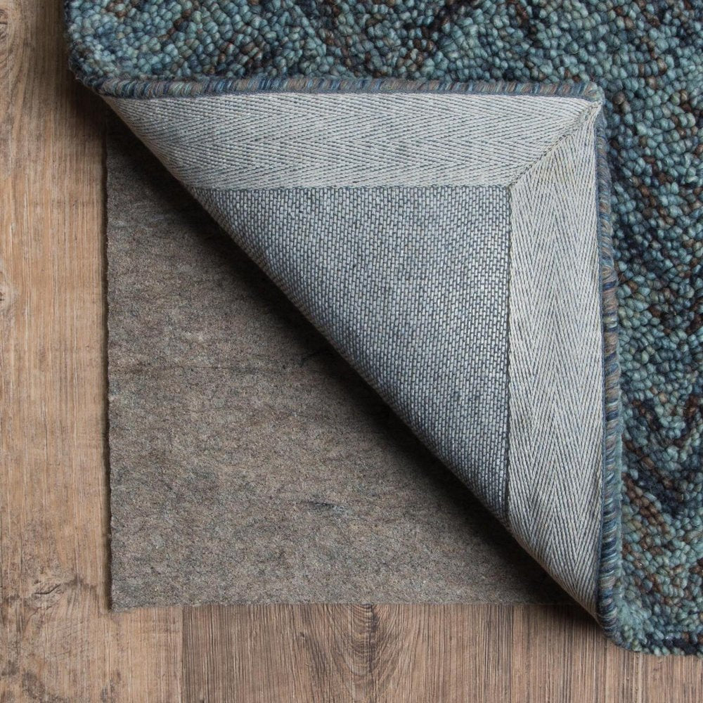6' x 9' Gray Non Slip Rug Pad shown as a full-frame view of the gray and tan surface.