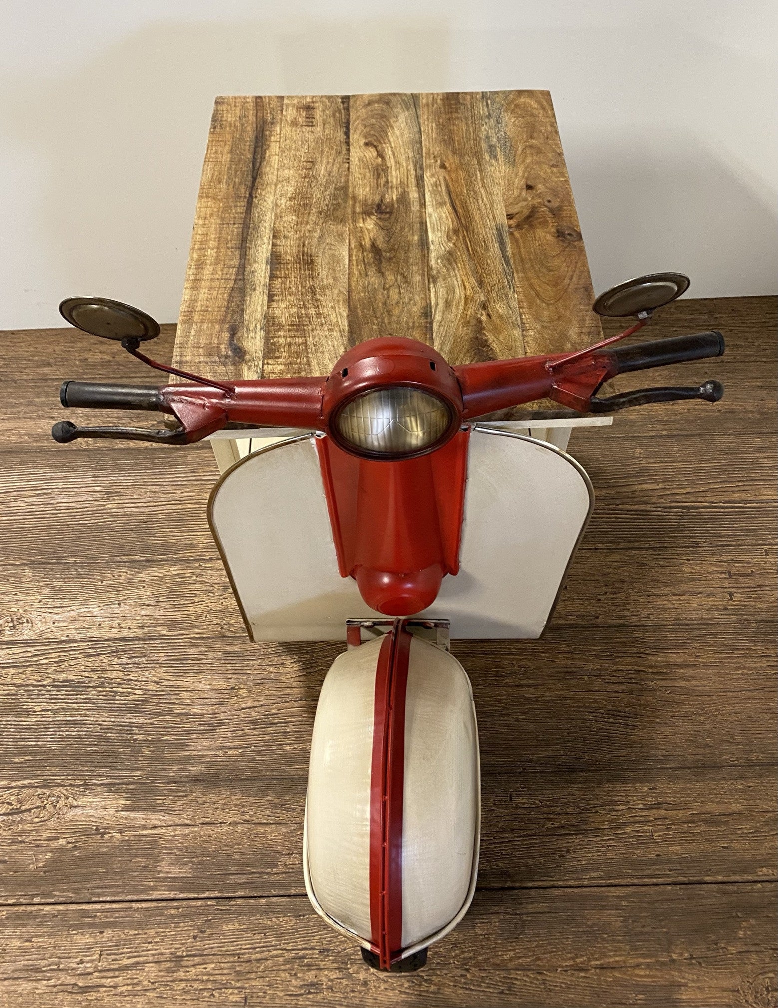 Rustic Red And Vanilla Scooter Cabinet in a home interior