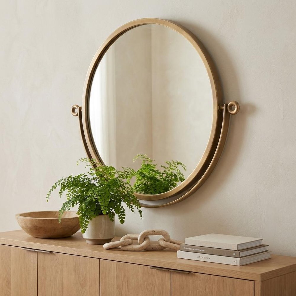 Gold Round Wall Mount Mirror in a home interior