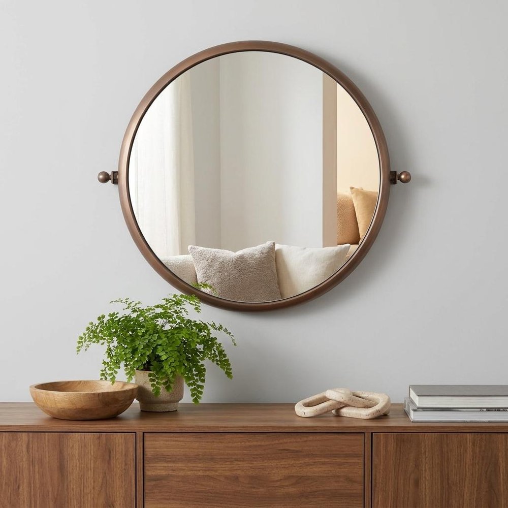 Industrial Gold Round Mirror in a home interior