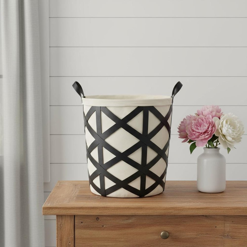 Set of Two Black And Cream Metal Basket in a home interior