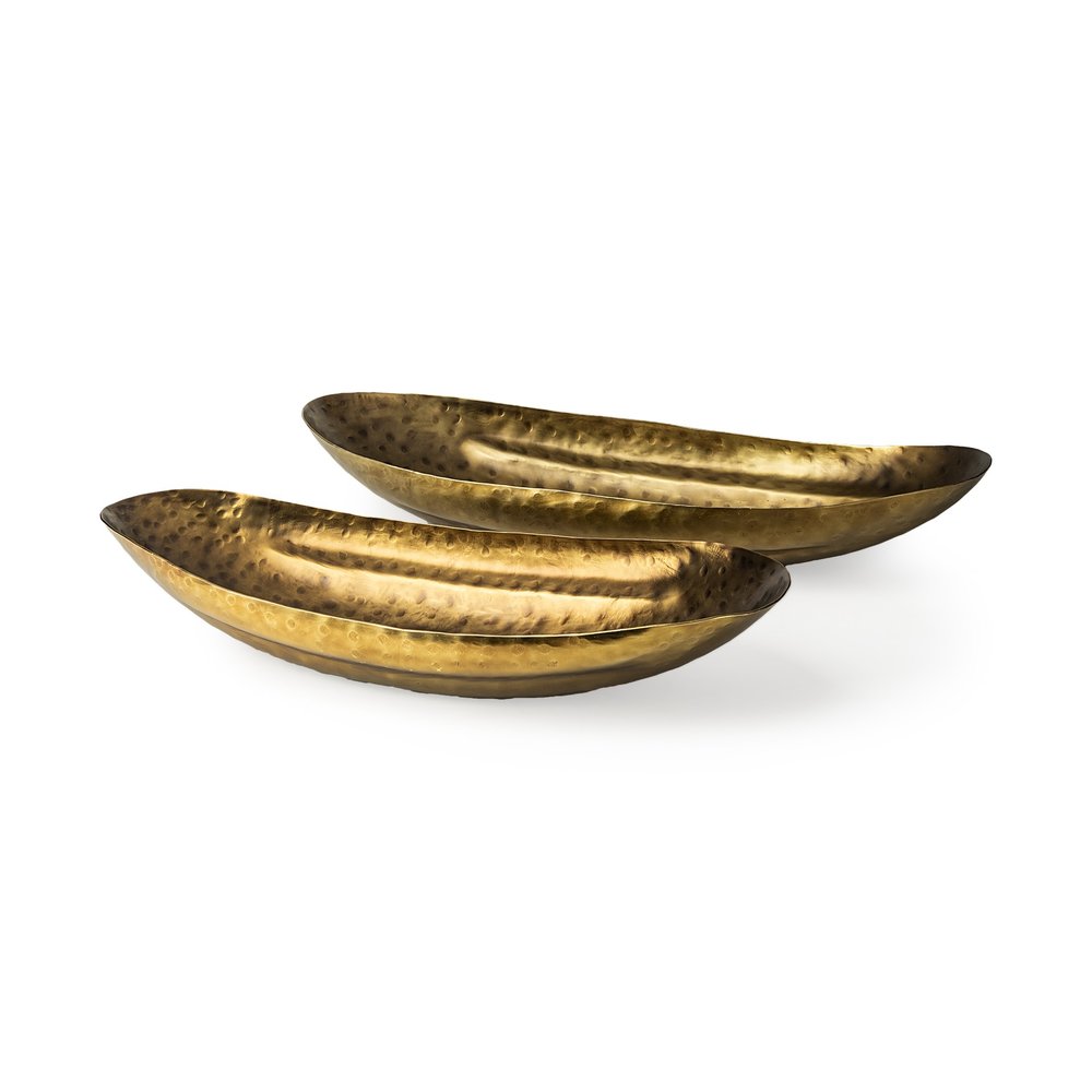 Set of Two Gold Hammered Metal Boat Shaped Decorative Bowls on a white background