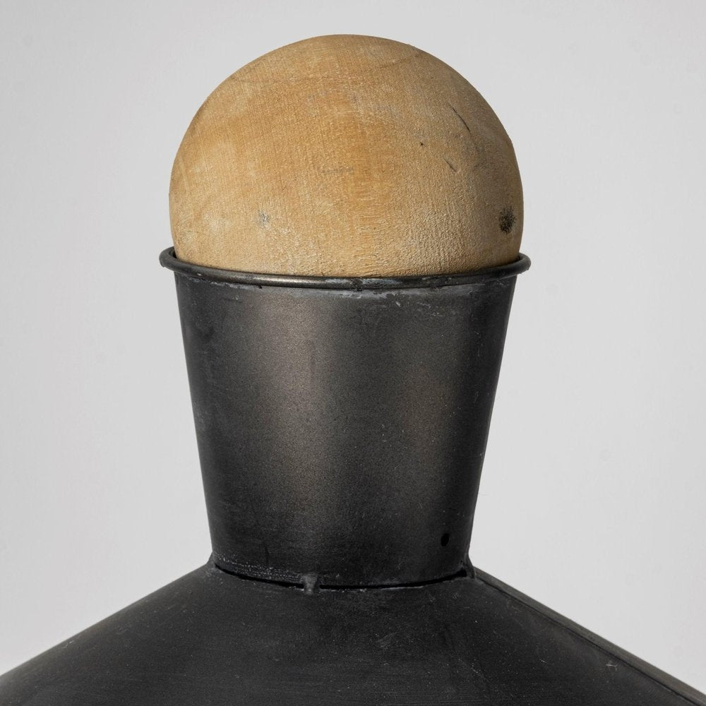 Set of Two Black and Brown Metal Cylindrical Urns in a home interior