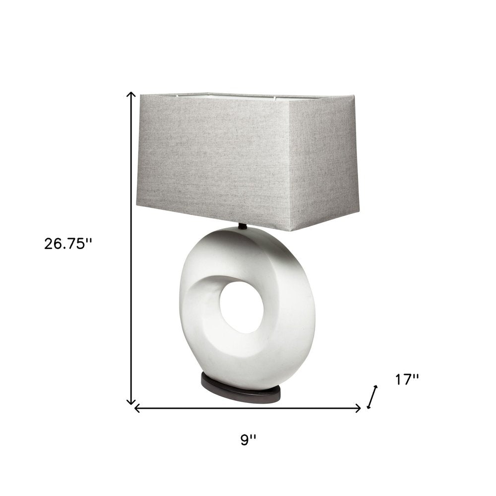 27" White Geometric Table Lamp With Gray Shade. Table lamp isolated on a plain white background, showing its white color.