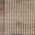 6' x 9' Ivory Striped Weave Non Slip Rug Pad shown as a full-frame view of the dark brown and tan surface.