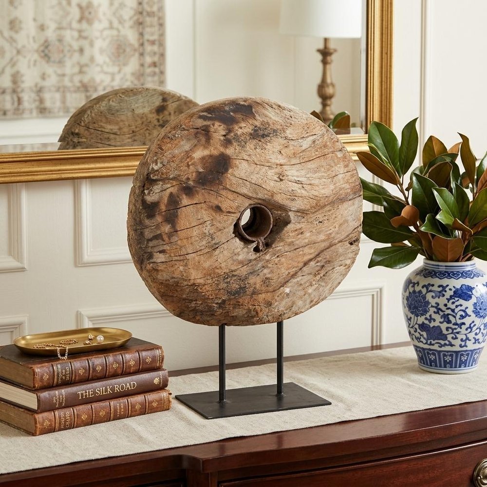 26" Brown Tabletop Sculpture displayed on a tabletop in a furnished interior against a cream wall.