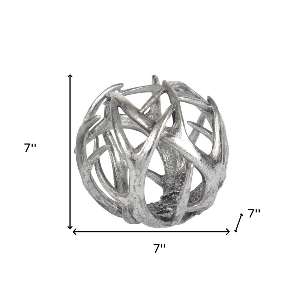 7" Silver Metal Tabletop Sculpture on a white background