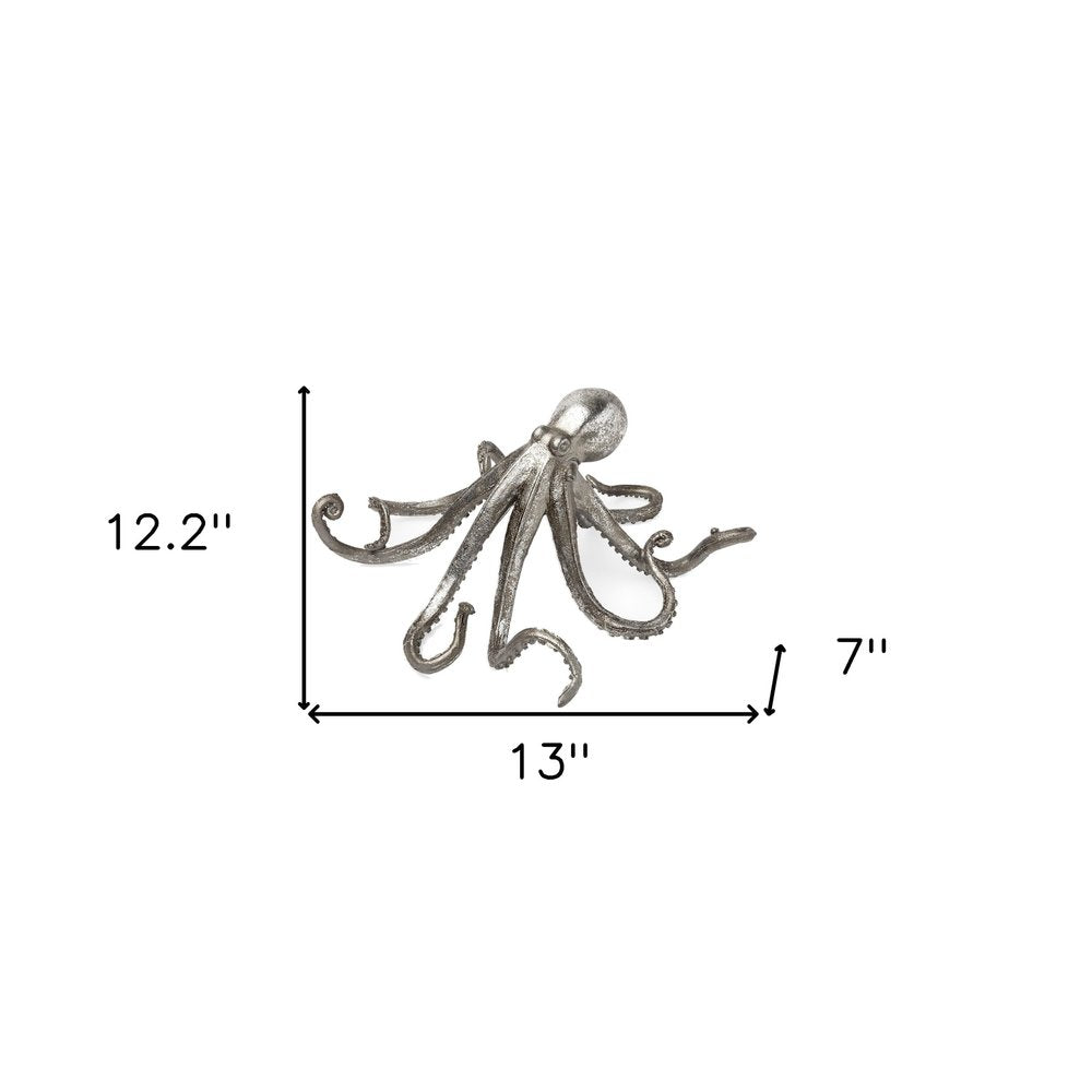 12" Antiqued Silver Resin Octopus Tabletop Sculpture. Sculpture isolated on a plain white background, in a silver resin finish.