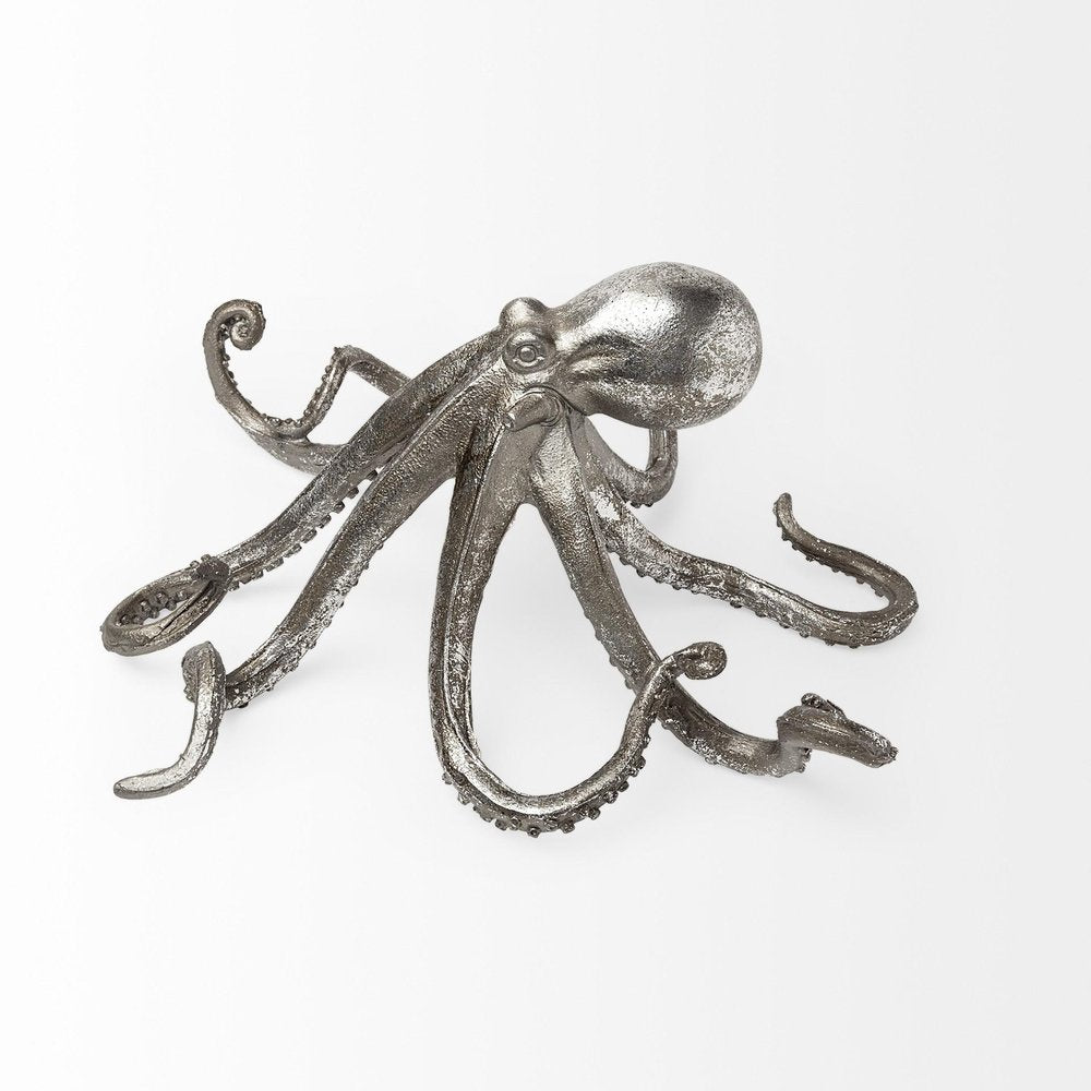 12" Antiqued Silver Resin Octopus Tabletop Sculpture. Sculpture isolated on a plain white background, showing a silver resin surface.