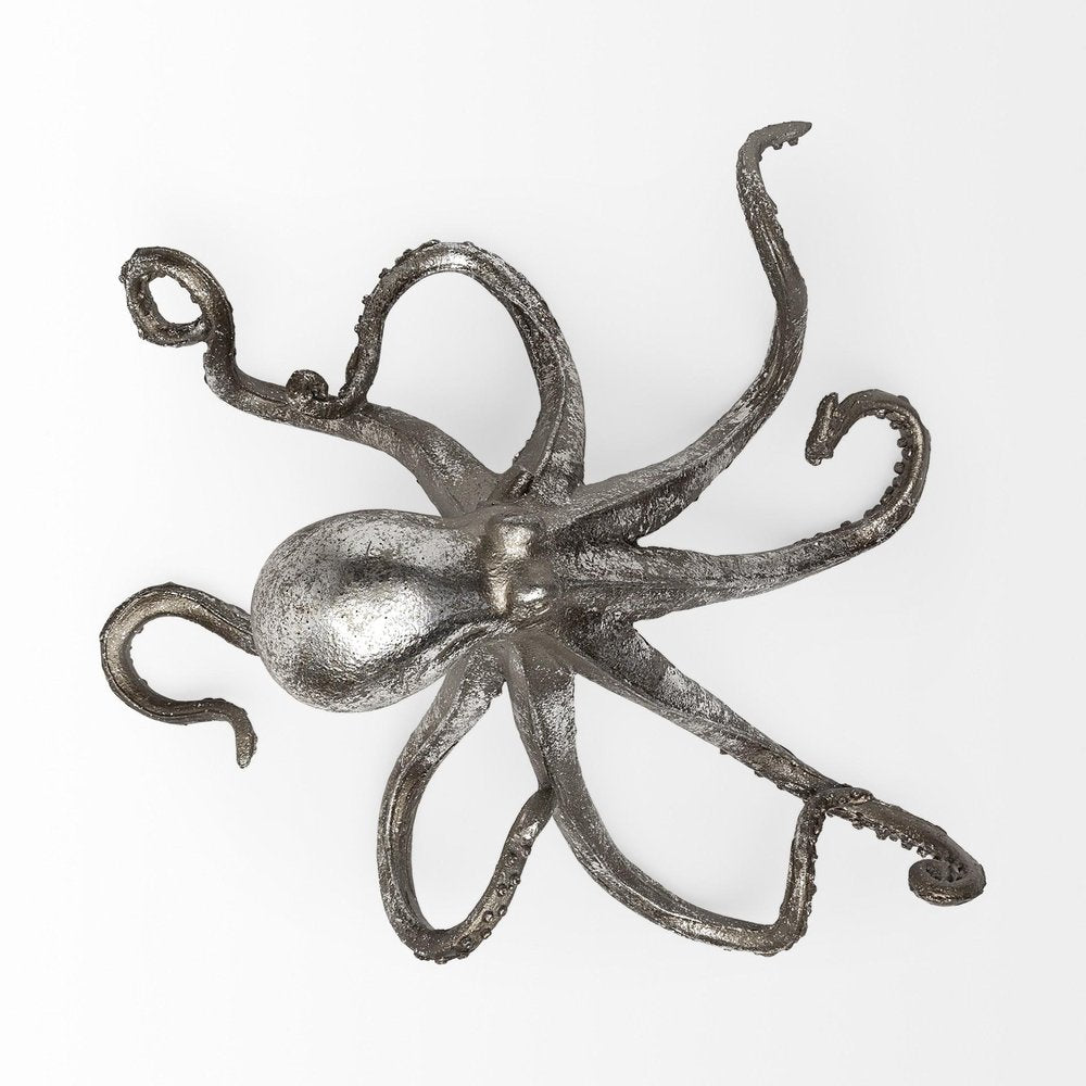 12" Antiqued Silver Resin Octopus Tabletop Sculpture. Sculpture isolated on a plain white background, showing a silver resin surface.