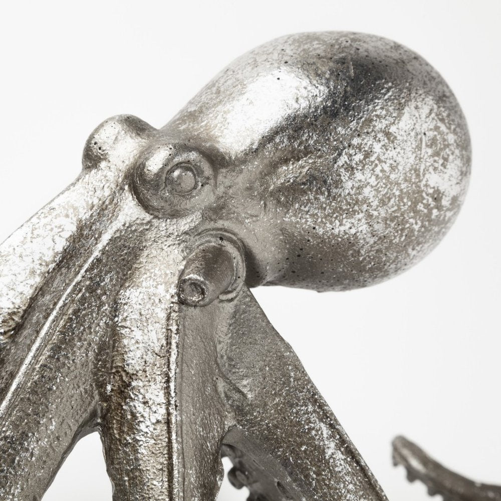 12" Antiqued Silver Resin Octopus Tabletop Sculpture. Sculpture isolated on a plain white background, showing a silver resin surface.