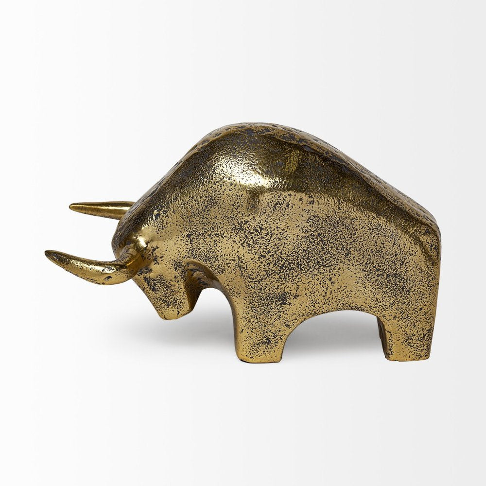 Gold Cast Aluminum Raging Bull Sculpture on a white background