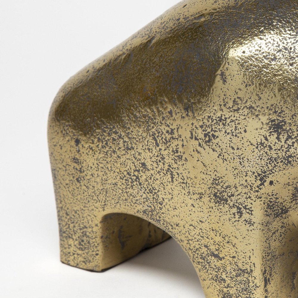 Gold Cast Aluminum Raging Bull Sculpture on a white background