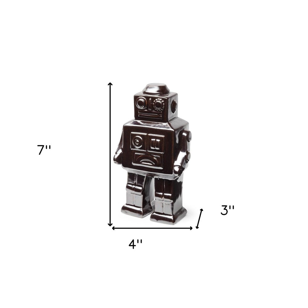 7" Silver Metal Robot Shaped Sculpture on a white background