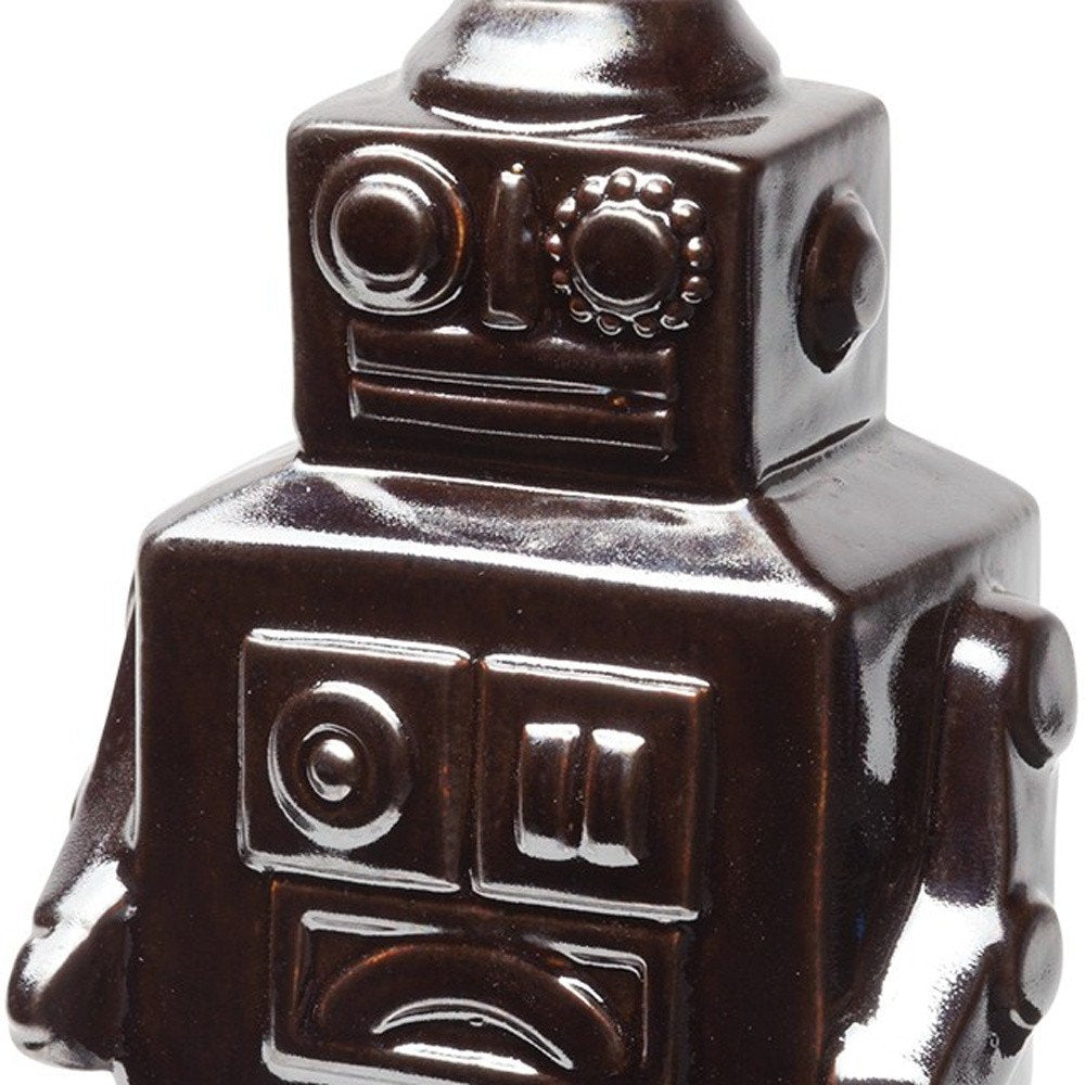 7" Silver Metal Robot Shaped Sculpture on a white background