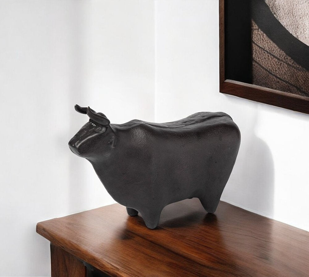 6" Black Metal Tabletop Sculpture. Sculpture in black metal.