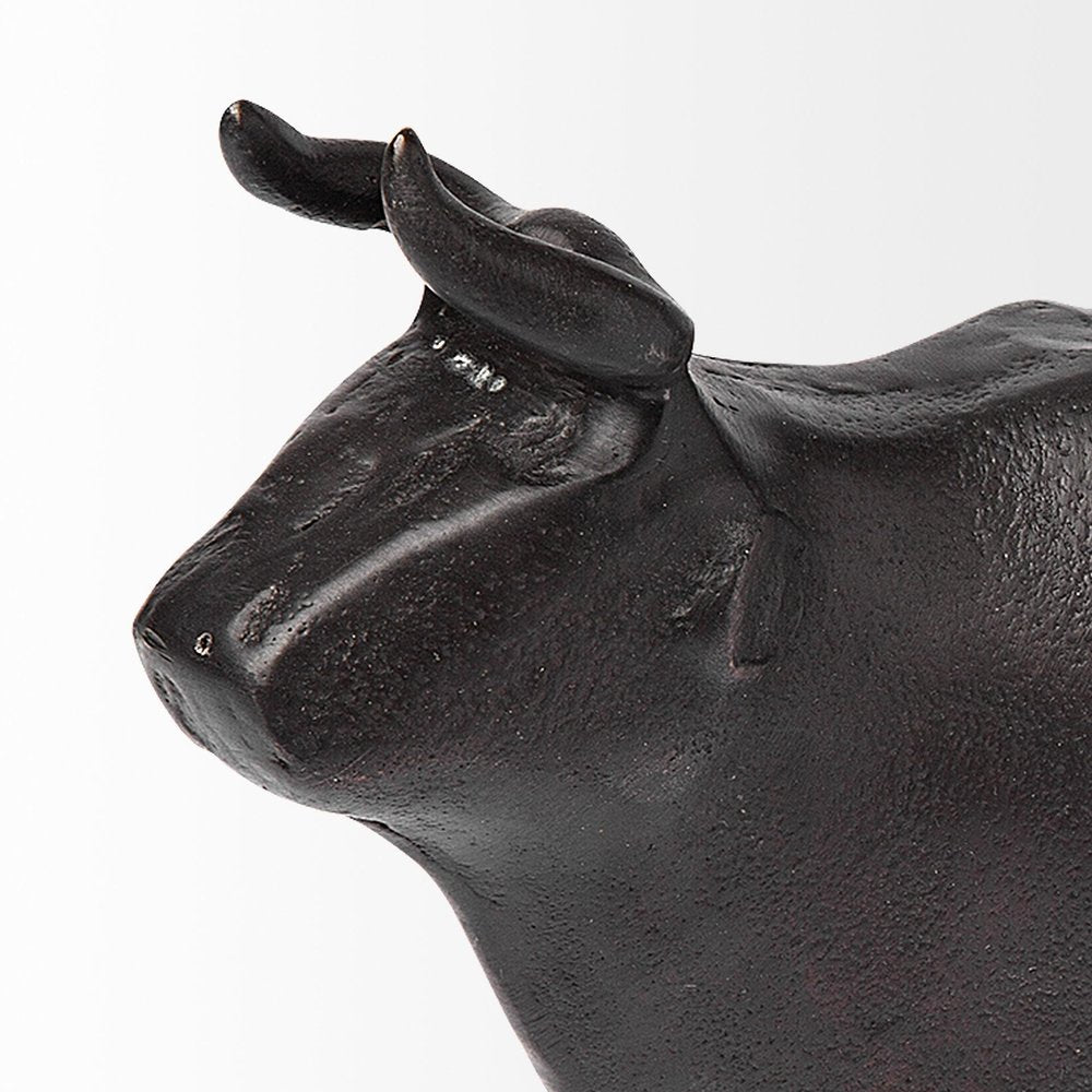 6" Black Metal Tabletop Sculpture. Sculpture isolated on a plain white background, showing a black metal surface.