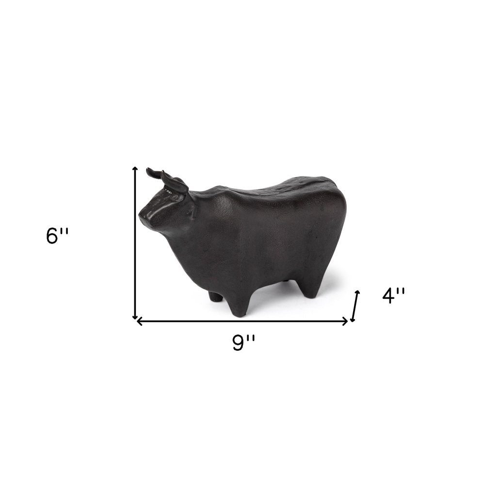 6" Black Metal Tabletop Sculpture. Sculpture isolated on a plain white background, in a black metal finish.
