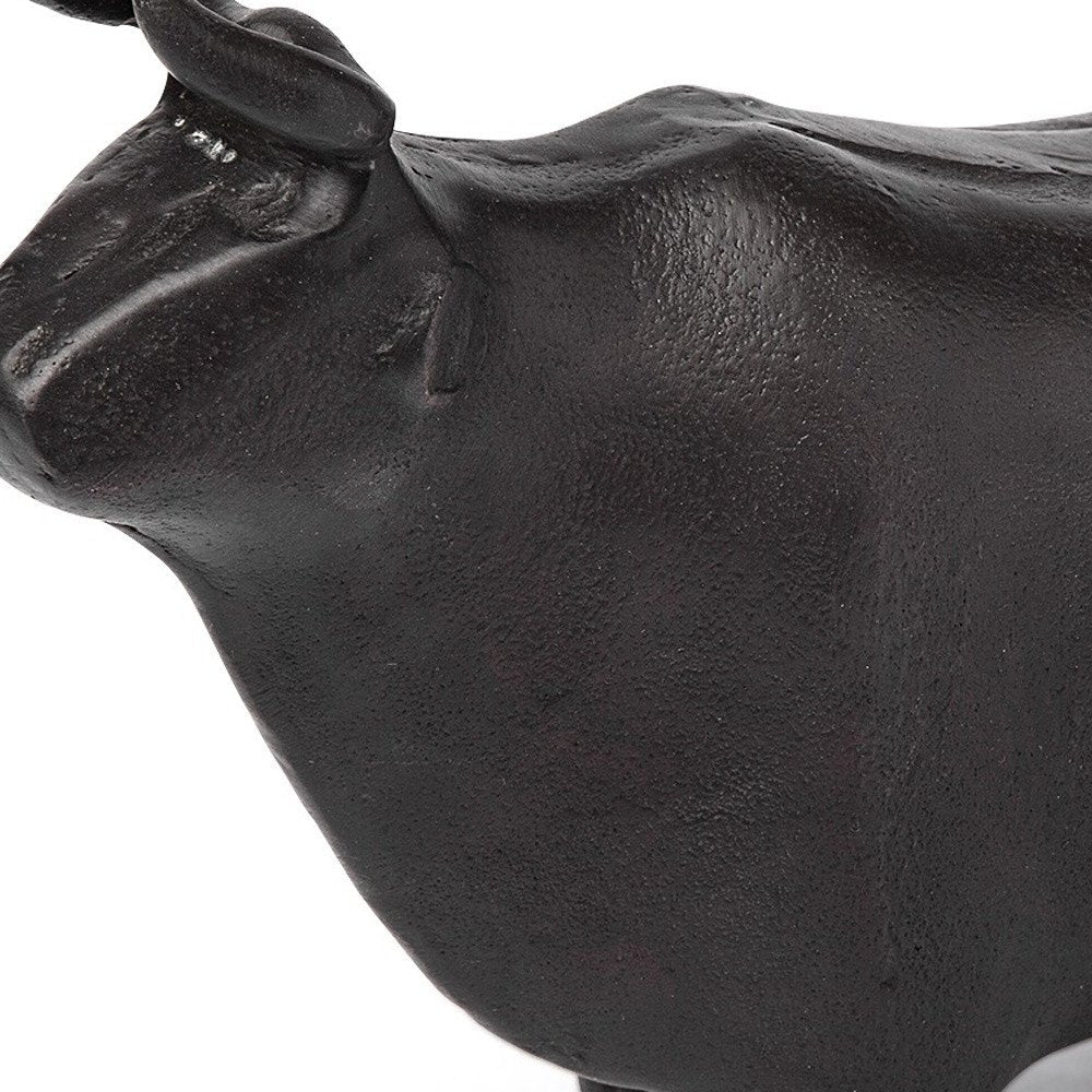 6" Black Metal Tabletop Sculpture. Sculpture isolated on a plain white background, showing a black metal surface.