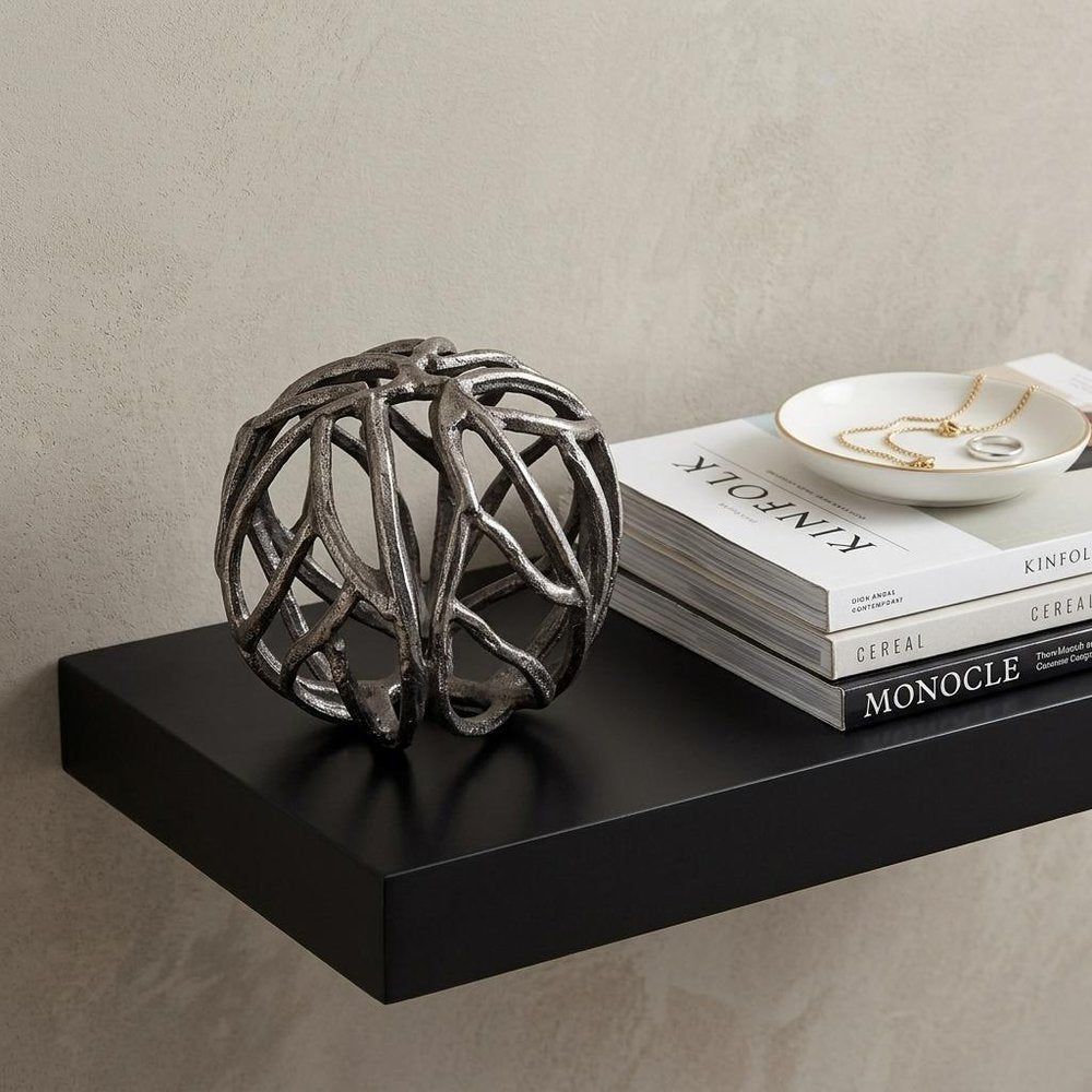 Silver Metal Tree Branch Sculpture in a home interior