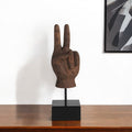13" Brown Fabric Hand Tabletop Sculpture. Sculpture isolated on a plain white background, finished in brown fabric.