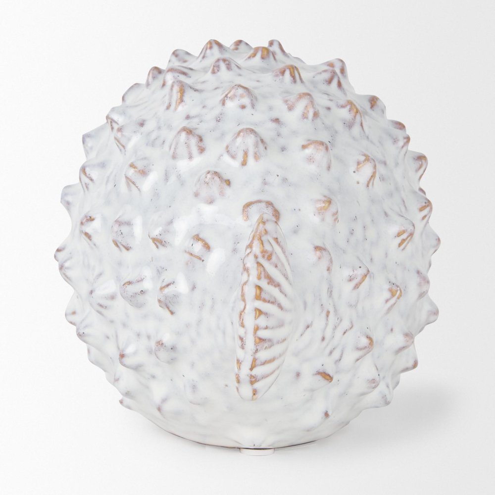 6" White Ceramic Puffer Fish Tabletop Sculpture. Sculpture isolated on a plain white background, showing a off-white ceramic surface.
