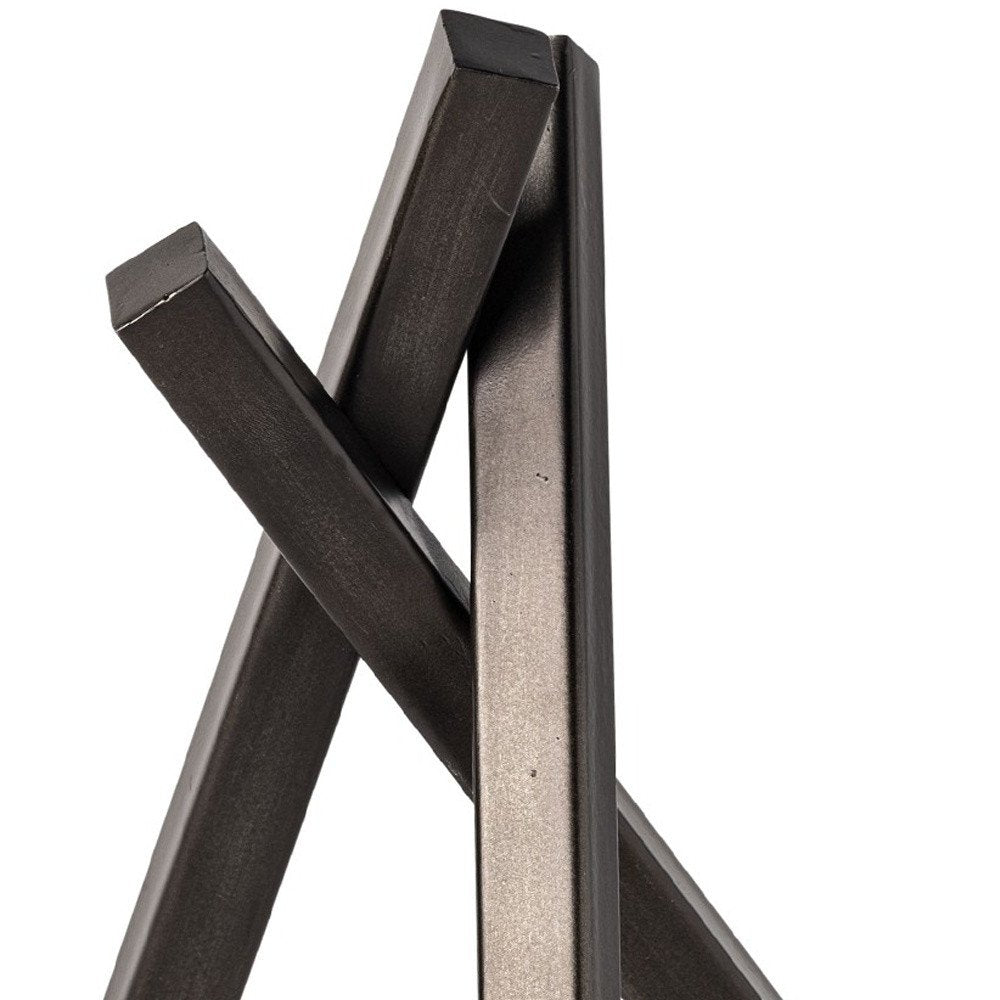 10" Black Metal Abstract Tabletop Sculpture. Sculpture isolated on a plain white background, finished in black metal.