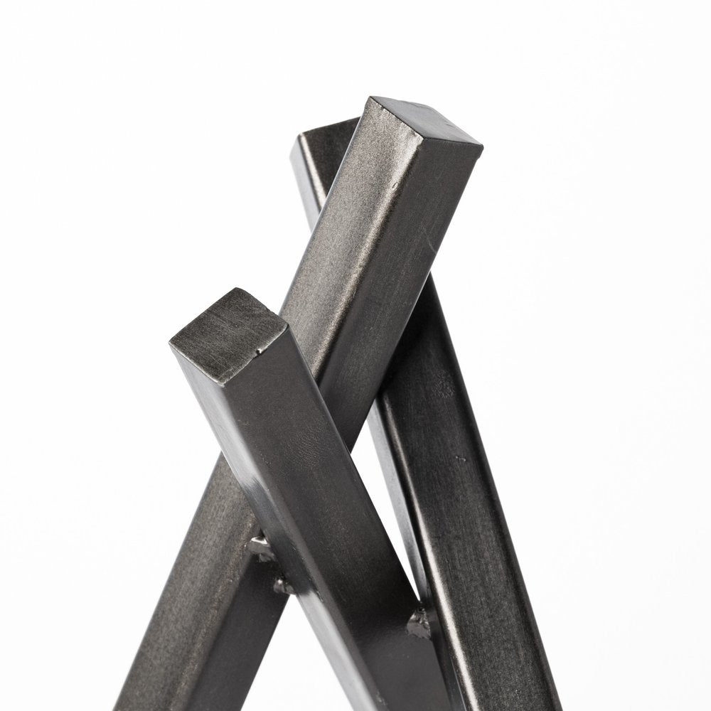 10" Black Metal Abstract Tabletop Sculpture. Sculpture isolated on a plain white background, showing a black metal surface.