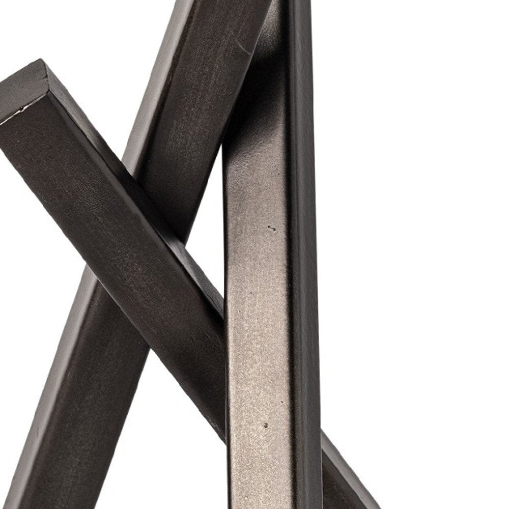 10" Black Metal Abstract Tabletop Sculpture. Sculpture isolated on a plain white background, in a black metal finish.
