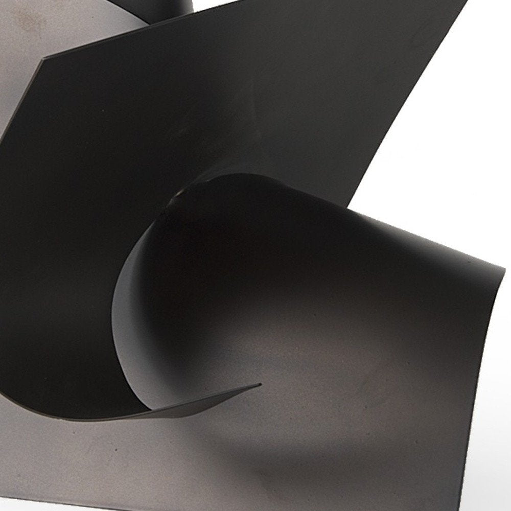Cropped view of 12" Contempo Antiqued Black Abstract Sculpture focusing on the black surface.
