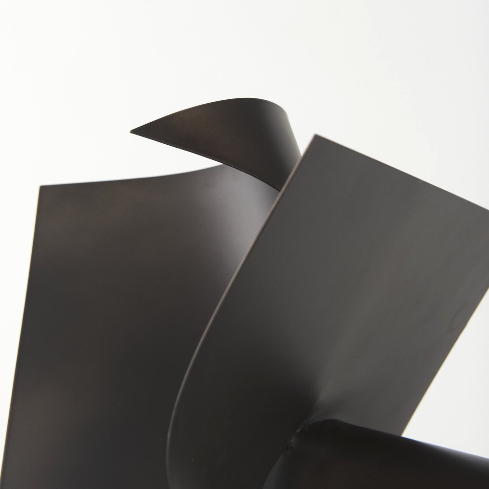 12" Contempo Antiqued Black Abstract Sculpture. Sculpture isolated on a plain white background, showing its black color.