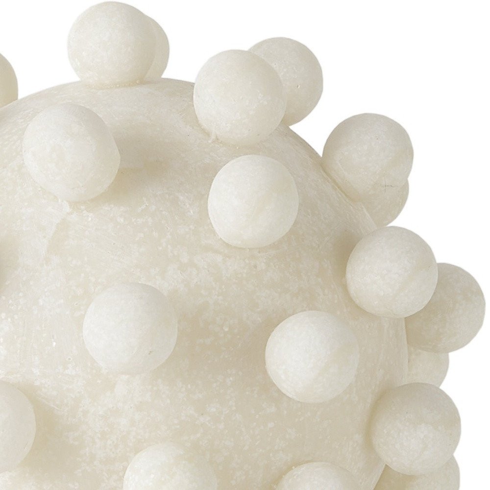 6" Ivory Resin Knobby Nubs Orb Tabletop Sculpture. Sculpture isolated on a plain white background, in a ivory resin finish.