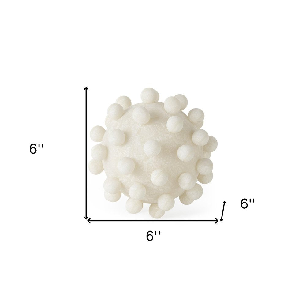 6" Ivory Resin Knobby Nubs Orb Tabletop Sculpture. Sculpture isolated on a plain white background, finished in ivory resin.
