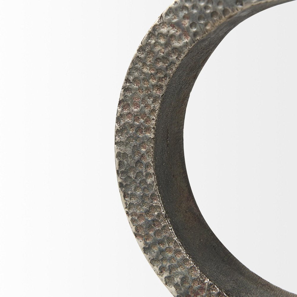 Two Ring Gray Hammered Metal Sculpture on a white background