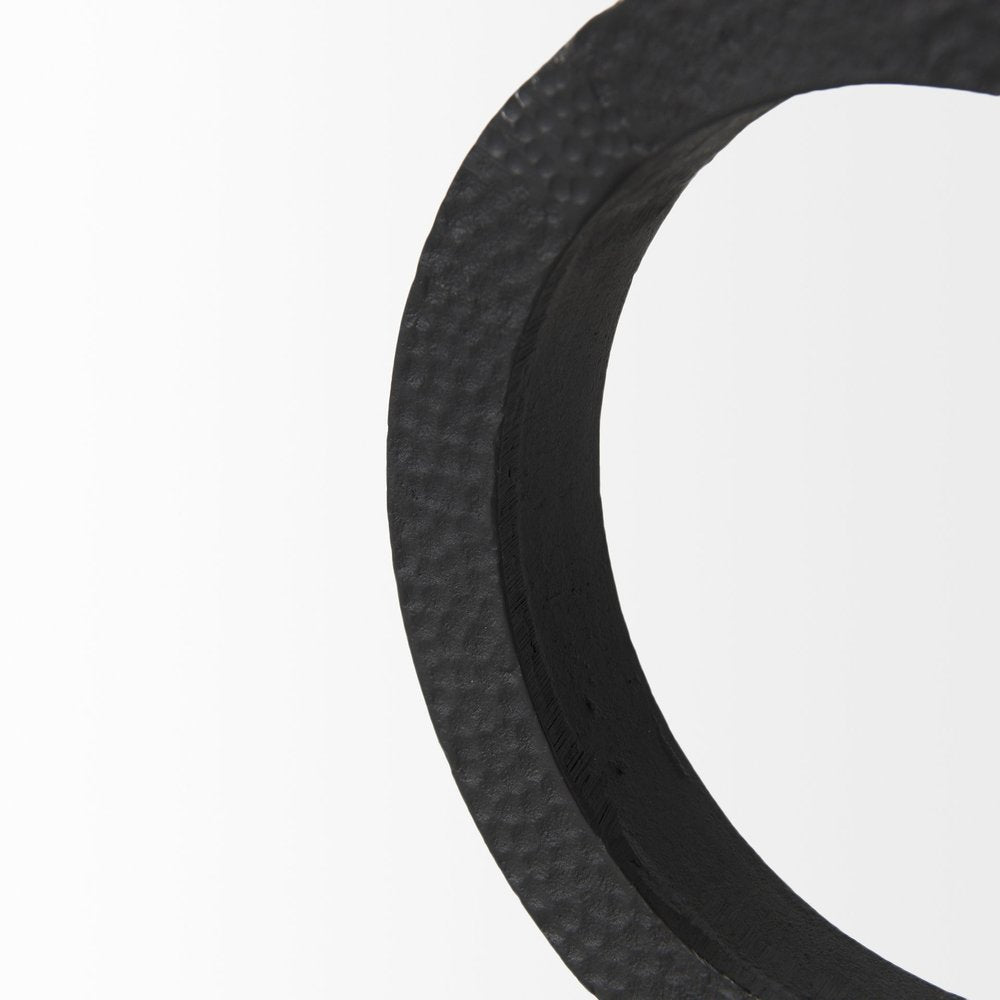 Two Ring Black Hammered Metal Sculpture on a white background