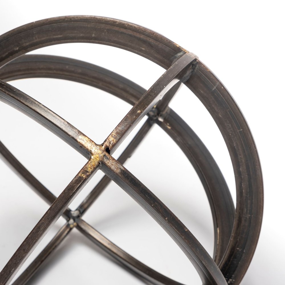 Petite Black Metal Circular Decorative Object on a white background