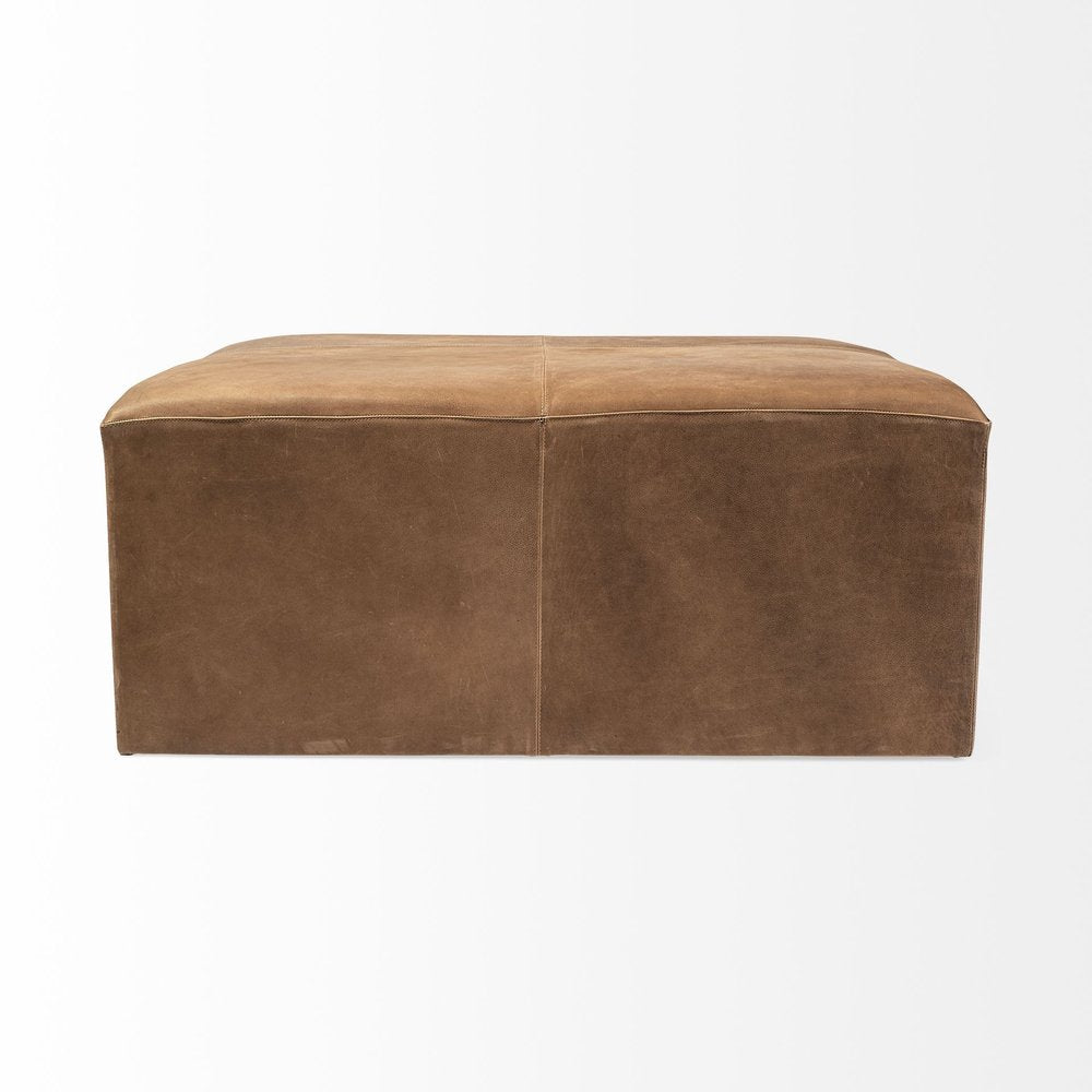 36" Brown Genuine Leather Cube Ottoman. Ottoman isolated on a plain white background, finished in brown leather.