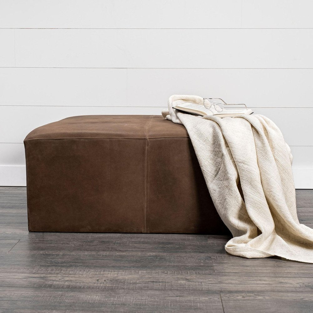 36" Brown Genuine Leather Cube Ottoman. Ottoman in brown leather.